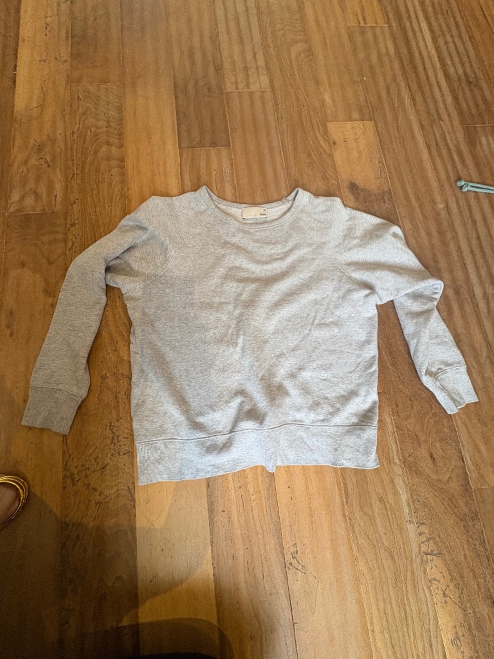Wilfred crewneck sweatshirt.
